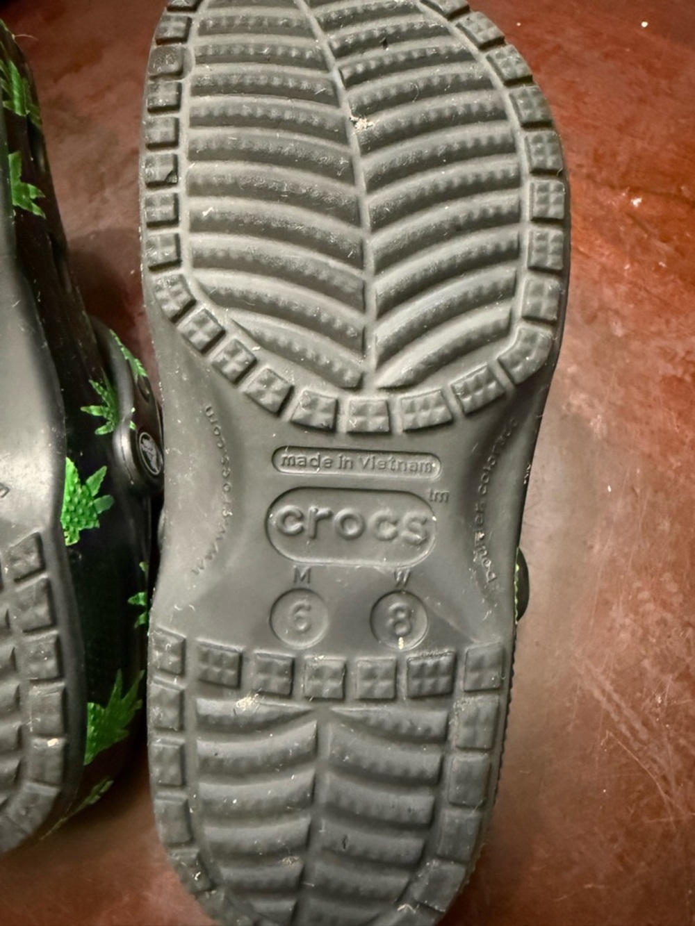 CROCS Black Clogs with Bright Green Leaf - Picture 4 of 4
